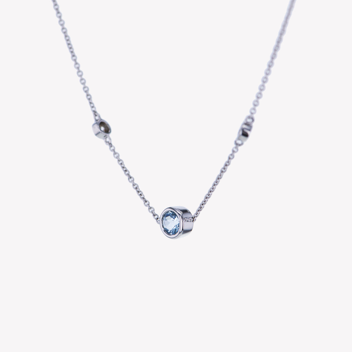 Gold necklace with aquamarine stone top