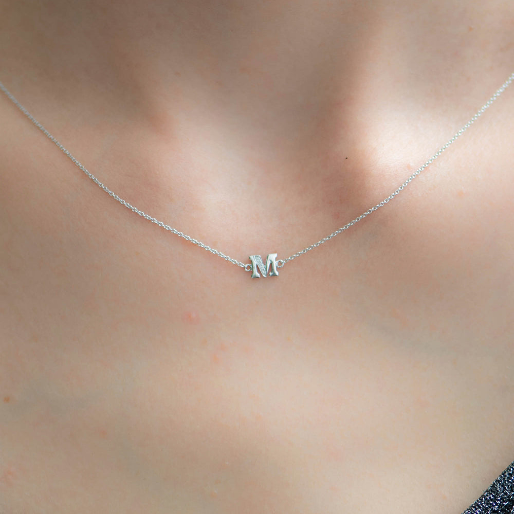 
                  
                    Letter M Diamond Pendant With Chain in White Gold
                  
                