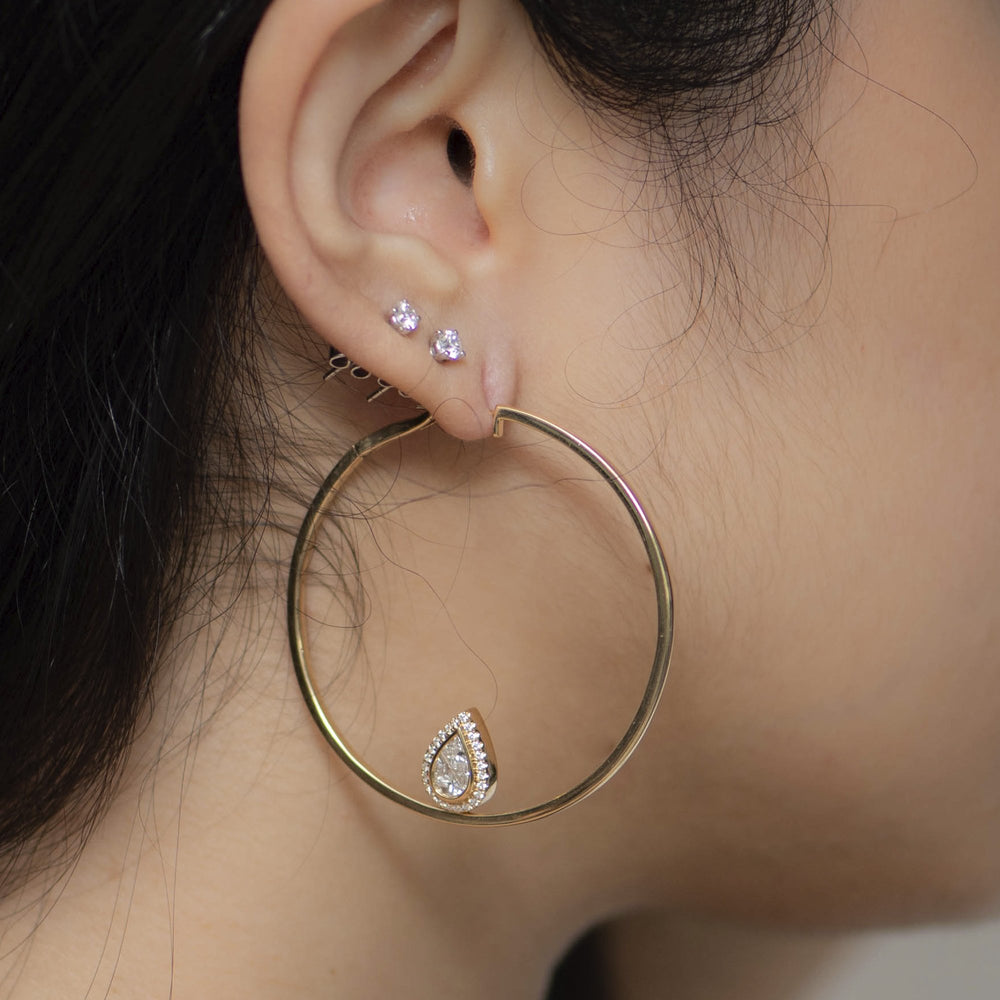 
                  
                    Yellow Gold Hoops with Pear Cluster Add-on
                  
                